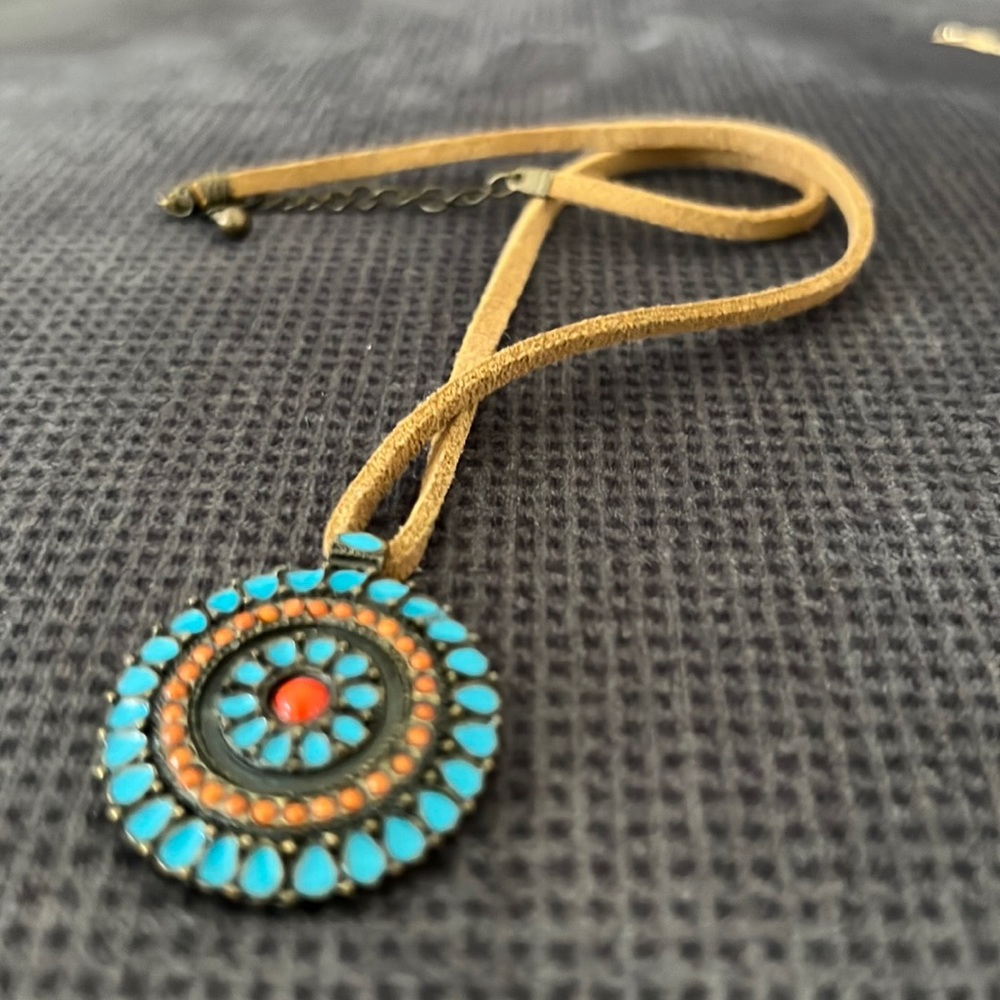 Leather necklace with medallion